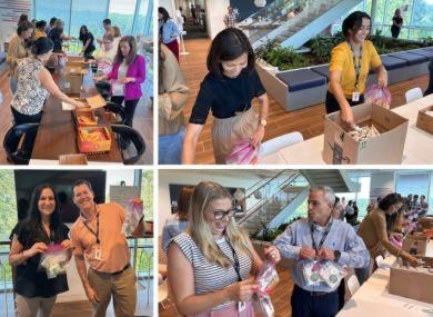 Colleagues pack care kits for Roots with Purpose